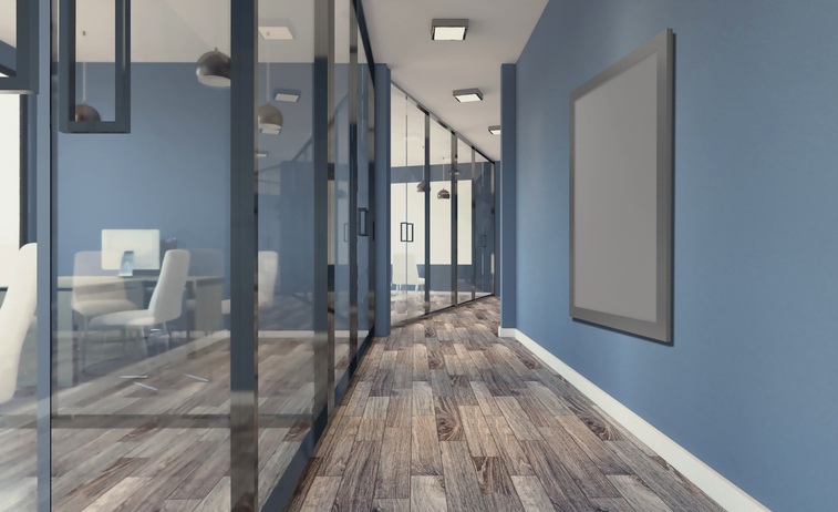 Commercial interior painting in a modern office hallway in Palm Beach County, FL